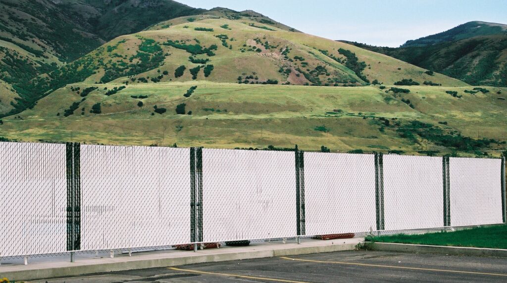 Chain Link Fence Slats for Spring - Bottom Lock Privacy Slats - Pexco PDS
