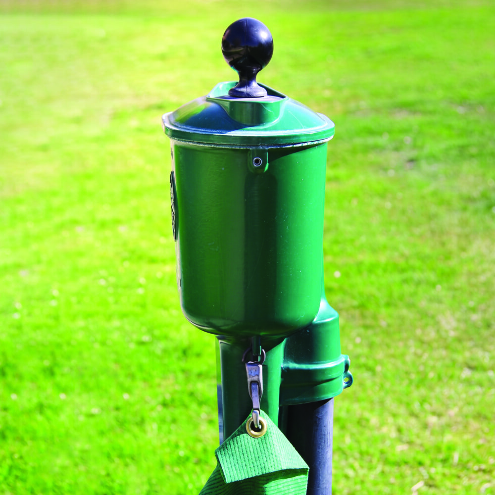 VinylGuard Golf ball washer post cover on a golf course ball washing station
